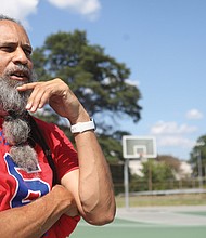 Milton Bell, 53, stands Friday on the courts where he honed his basketball skills as a child growing up in the Randolph Community. After playing basketball
at the University of Richmond and Georgetown University, Mr. Bell played on professional teams in Europe and South America. He is the founder and director of the Milton Bell Basketball School, which helps Richmond area youths gain basketball skills.