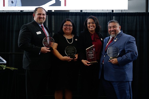 From left, Lemuel Bardeguez, Dr. Juanita Ortiz, Dr. Mautra Staley Jones and Robert Ruiz were honored at the Oklahoma Hispanic Institute's Top 40 Hispanic Leadership Awards luncheon today in the OCCC Visual and Performing Arts Center.