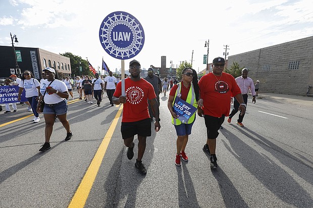 United Auto Workers members march in the Detroit Labor Day Parade on September 4 in Detroit, Michigan.
Mandatory Credit:	Bill Pugliano/Getty Images