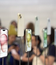 iPhone 15 and 15 Plus models are displayed during an announcement of new products on the Apple campus on September 12 in Cupertino, California.
Mandatory Credit:	Jeff Chiu/AP