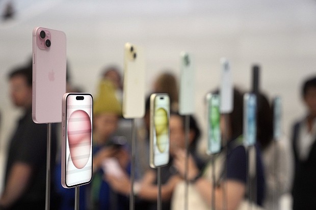 iPhone 15 and 15 Plus models are displayed during an announcement of new products on the Apple campus on September 12 in Cupertino, California.
Mandatory Credit:	Jeff Chiu/AP