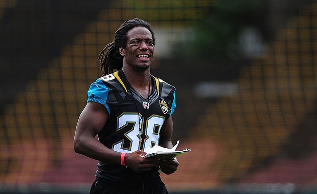 Sergio Brown is shown here helping to coach a team of local school children on July 15, 2015, in London, England.
Mandatory Credit:	Dan Mullan/Getty Images/File