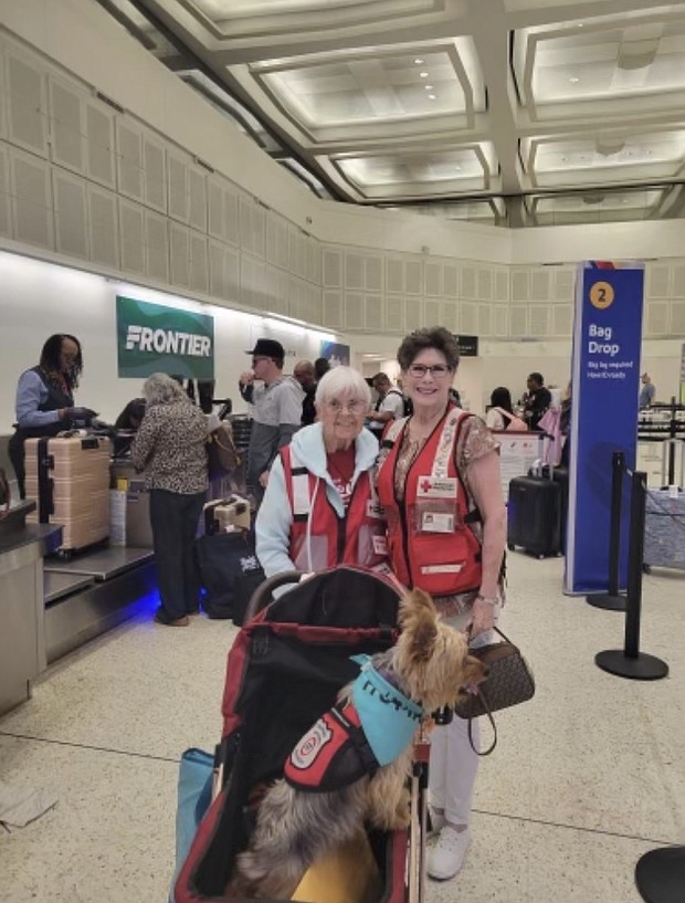 American Red Cross volunteer Patricia Labossiere (on the left) from the Southeast and East Deep Texas chapter is flying out of Houston Texasheading to Portland Maine to support disaster relief operations for Hurricane Lee.  Red Cross volunteer Stacy O'Quinn (on the right) stepped up immediately to offer her a ride to the airport and of course big hugs before her deployment.