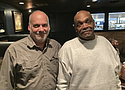 John Lewis Left Stands with Jesse Johnson at a Restaurant in Lake Oswego