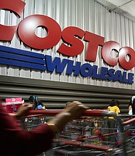 Shoppers outside a Costco store in the Queens borough of New York, US, on Saturday, May 13. Costco is now offering members online health checkups for as low as $29.
Mandatory Credit:	Bing Guan/Bloomberg/Getty Images