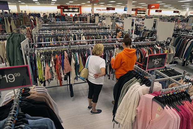 TJ Maxx's offering of discounted branded products is especially appealing to budget-conscious households.
Mandatory Credit:	David L. Ryan/The Boston Globe/Getty Images