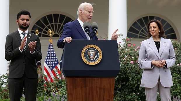 President Joe Biden speaks as  Rep. Maxwell Frost and Vice President Kamala Harris listen during a Rose Garden event on gun safety at the White House on September 22 in Washington, DC.
Mandatory Credit:	Alex Wong/Getty Images