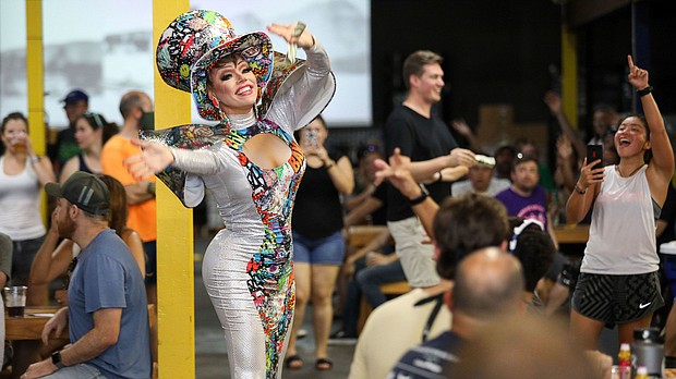 Dessie Love Blake performs a song during Eureka Heights Drag Bingo, July 29, 2021, at Eureka Heights Brewery in Houston.
Mandatory Credit:	Jon Shapley/Houston Chronicle via AP