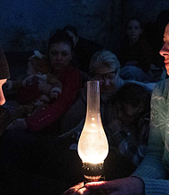 People take shelter in a youth theater in Mariupol, Ukraine, March 6, 2022. From 20 Days in Mariupol. (AP Photo/Mstyslavar FINAL Chernov)