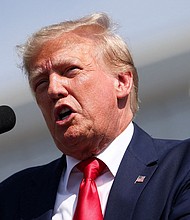 Former President Donald Trump is suing retired British intelligence officer Christopher Steele over the controversial dossier he compiled which shook Washington with its unverified and salacious allegations about Trump.
Mandatory Credit:	Sam Wolfe/Reuters