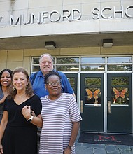 Debra Carlotti, center, is an instructional support and compliance coordinator at Mary Munford Elementary School in Richmond. After working more than four decades with students in special education programs and other areas of learning, she will retire at the end of the current school year. Ms. Carlotti is photographed Sept. 12 at the school with colleagues from left, Dr. Sametrian Miller, assistant principal, Greg Muzik, principal and Alezia Mason, instructional assistant.