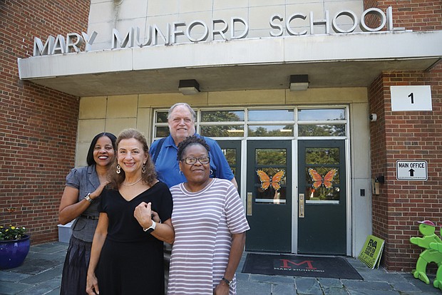 Debra Carlotti, center, is an instructional support and compliance coordinator at Mary Munford Elementary School in Richmond. After working more than four decades with students in special education programs and other areas of learning, she will retire at the end of the current school year. Ms. Carlotti is photographed Sept. 12 at the school with colleagues from left, Dr. Sametrian Miller, assistant principal, Greg Muzik, principal and Alezia Mason, instructional assistant.