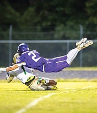 A pass to Dabney is broken up by James River’s Henry Brown, No. 2.