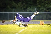 A pass to Dabney is broken up by James River’s Henry Brown, No. 2.