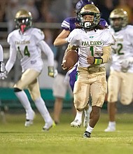 Huguenot Falcons running back Michael Dabney Jr., No. 1, takes the ball down the field.