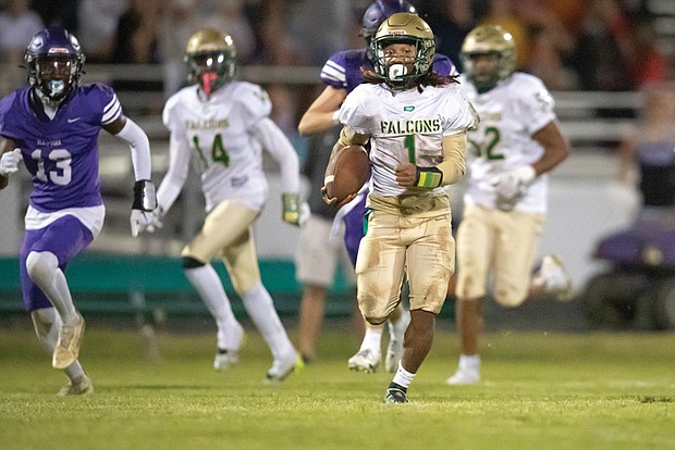 Huguenot Falcons running back Michael Dabney Jr., No. 1, takes the ball down the field.