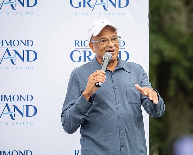 Alfred Liggins III, CEO of Urban One Inc. greets attendees during the Richmond Grand Resort and Casino Block Party on Saturday, Sept. 30, at the proposed site for the project onWalmsley Boulevard at Commerce Road in Richmond’s South Side. Urban One is one of the development partners for the casino, and Mr. Liggins discussed the positive impacts the planned casino will have on Richmond, including new jobs.