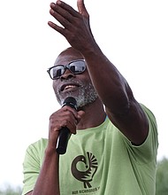 Actor Djimon Hounsou speaks during the finish of Run Richmond 16.19, a cultural running event he hosted on Sept. 30. Also collaborating in the event were the Black History Museum and Cultural Center of Virginia and Sports Backers.