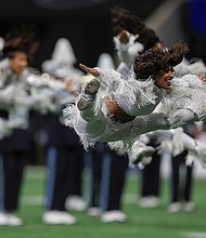 Members of the Prancing J-Settes dance during the Jackson State Tigers and North Carolina Central Eagles Celebration Bowl Football Championship game at Mercedes Benz Stadium on December 17, 2022, in Atlanta, GA (Photo by Charles A. Smith/Jackson State University via Getty Images)