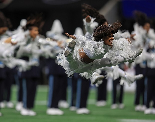 Members of the Prancing J-Settes dance during the Jackson State Tigers and North Carolina Central Eagles Celebration Bowl Football Championship game at Mercedes Benz Stadium on December 17, 2022, in Atlanta, GA (Photo by Charles A. Smith/Jackson State University via Getty Images)