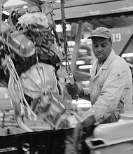 A black auto worker installs engines into Ford automobiles at the Ford Motor Company Willow Run plant in Detroit, Michigan, at a time in 1963 when African Americans rarely held such positions.
Mandatory Credit:	Bettmann/Getty Images