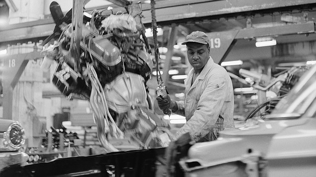 A black auto worker installs engines into Ford automobiles at the Ford Motor Company Willow Run plant in Detroit, Michigan, at a time in 1963 when African Americans rarely held such positions.
Mandatory Credit:	Bettmann/Getty Images