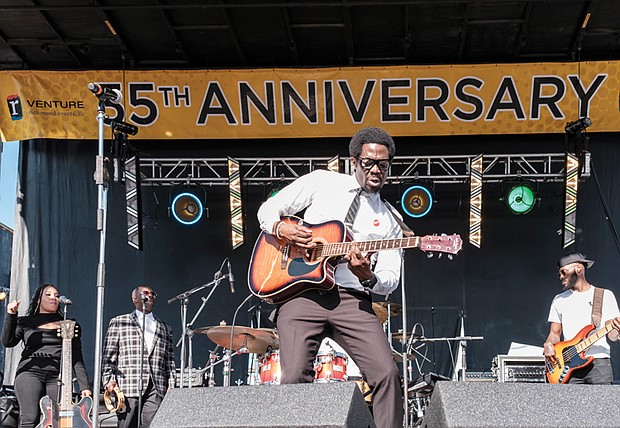 Rodney “The Soul Singer” Stith, above, plays to the crowd on the festival’s main stage.