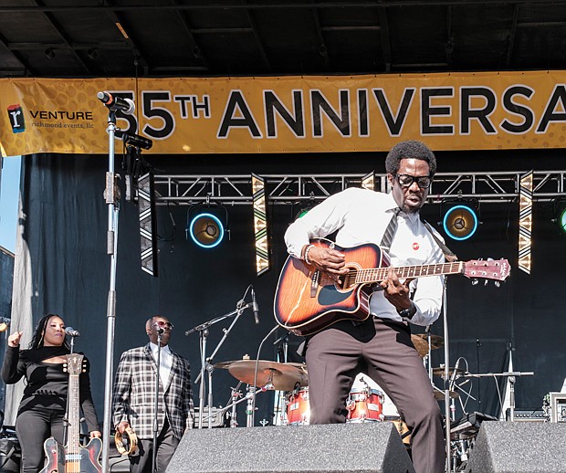 Rodney “The Soul Singer” Stith, above, plays to the crowd on the festival’s main stage.