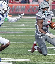 Virginia Union University’s Jada Byers zig-zags for 245 yards and two touchdowns in VUU’s 42-20 CIAA win over Elizabeth City State.