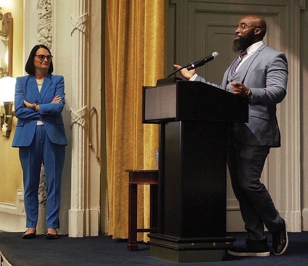 Perry Whitaker, a Drive to Work client, recently spoke during the Second Chance luncheon at the Jefferson Hotel about how the organization helped him obtain his driver’s license and employment after he was no longer incarcerated. Standing to his left is Drive to Work’s CEO Sara R. Wilson.