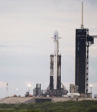 A SpaceX Falcon Heavy rocket with the Psyche spacecraft onboard is seen at Launch Complex 39A as preparations continue for the Psyche mission, Wednesday, Oct. 11, 2023, at NASA's Kennedy Space Center in Florida.
Mandatory Credit:	Aubrey Gemignani/NASA
