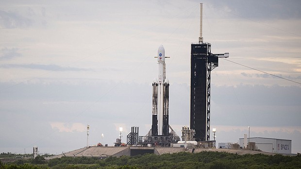 A SpaceX Falcon Heavy rocket with the Psyche spacecraft onboard is seen at Launch Complex 39A as preparations continue for the Psyche mission, Wednesday, Oct. 11, 2023, at NASA's Kennedy Space Center in Florida.
Mandatory Credit:	Aubrey Gemignani/NASA