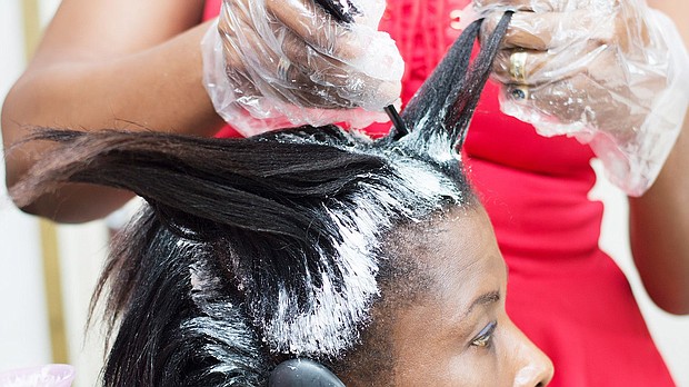 The US Food and Drug Administration is proposing to ban certain hair-straightening products, such as chemical relaxers and pressing products, that have been linked to health risks.
Mandatory Credit:	Adobe Stock