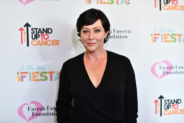 Shannen Doherty, seen here in 2017, was showered with love over the weekend. The actress reunited with some of her “Beverly Hills 90210” costars for a 90s Con panel in Tampa, Florida. Doherty has been living with stage 4 cancer. Toward the end of the event the audience gave her a standing ovation, according to People.
Mandatory Credit:	Earl Gibson III/Getty Images