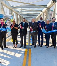 METRO Board Members and executives gathered with community stakeholders and elected officials to celebrate the new Post Oak Road Pedestrian Bridge.