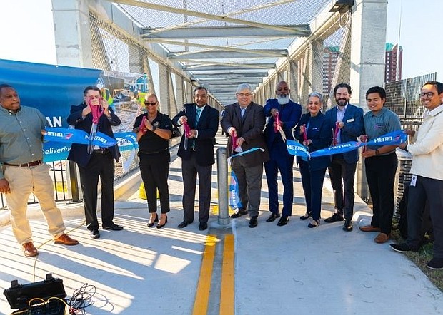 METRO Board Members and executives gathered with community stakeholders and elected officials to celebrate the new Post Oak Road Pedestrian Bridge.