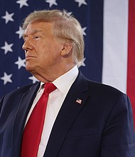 Republican presidential candidate former President Donald Trump speaks to guests during a rally on October 7 in Waterloo, Iowa.
Mandatory Credit:	Scott Olson/Getty Images