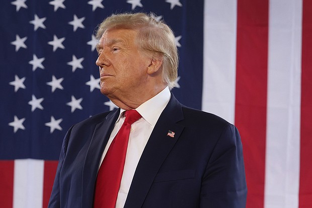 Republican presidential candidate former President Donald Trump speaks to guests during a rally on October 7 in Waterloo, Iowa.
Mandatory Credit:	Scott Olson/Getty Images