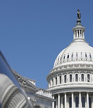 The dome of the U.S. Capitol is reflected in a window on Capitol Hill in Washington, on April 20. House Republicans will meet on October 24 to pick a new speaker nominee from a crowded field.
Mandatory Credit:	Amanda Andrade-Rhoades/Reuters