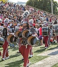 Virginia Union University’s alumni, students, faculty and friends celebrate their homecoming win over Lincoln University 57-0 on Oct. 21 at Hovey Field.