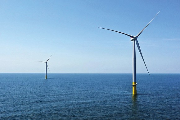 A power company’s plans for an enormous offshore wind farm off Virginia’s coast gained key federal approval Tuesday after the ...