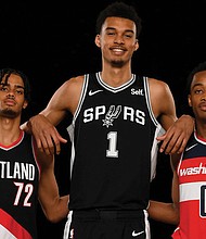 Three NBA rookies from France, from left, are Rayan Rupert of Portland, Victor Wembanyama of San Antonio, and Bilal Coulibaly of Washington.