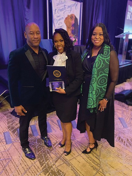 During the luncheon event, Kimberley L. Martin, founder of the KLM Scholarship Foundation, received the MBL’s Remarkable Woman of the Year Award. From left, Floyd E. Miller, MBL’s president and CEO, Mrs. Martin and Nickkol Lewis, board chair, MBL, principal and senior creative, Visual Appeal, LLC-The Design Studio.