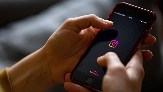 The logo of the Instagram app is seen on the screen of a smartphone in 2021.
Mandatory Credit:	Fabian Sommer/picture alliance/dpa/Getty Images