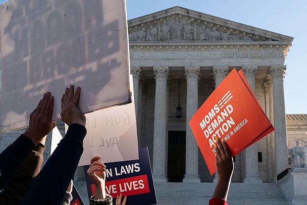 Supporters of gun control at the Supreme Court in 2021.
Mandatory Credit:	Joshua Roberts/Getty Images