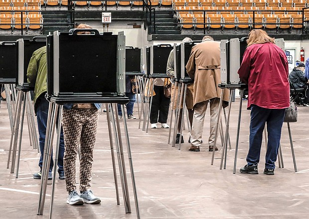 Voters fill out ballots during early voting for the Kentucky general election on November 2, in Owensboro, Kentucky.
Mandatory Credit:	Greg Eans/AP