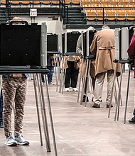 Voters fill out ballots during early voting for the Kentucky general election on November 2, in Owensboro, Kentucky.
Mandatory Credit:	Greg Eans/AP
