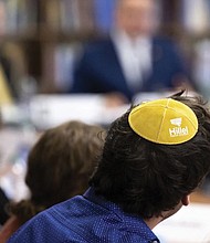 Samuel Winkler wears a Hillel kippah during a Nov. 2 visit by Education Secretary Miguel Cardona to Towson University to discuss antisemitism on college campuses in Towson, Md. The Biden administration is warning U.S. schools and colleges that they must take immediate action to stop antisemitism and Islamophobia on their campuses, citing an “alarming rise” in threats and harassment.