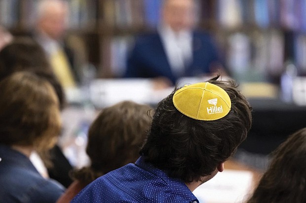 Samuel Winkler wears a Hillel kippah during a Nov. 2 visit by Education Secretary Miguel Cardona to Towson University to discuss antisemitism on college campuses in Towson, Md. The Biden administration is warning U.S. schools and colleges that they must take immediate action to stop antisemitism and Islamophobia on their campuses, citing an “alarming rise” in threats and harassment.
