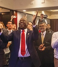 Delegate Don L. Scott Jr., center, celebrates wins by the Democrats. The Virginia House of Delegates
Minority Leader is poised to be the first Black Speaker of the House.